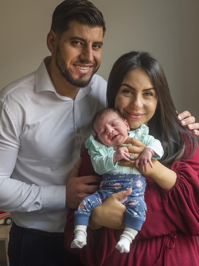 Parents Mete and Natasha Karan with their second child and first daughter Sofia. Picture: Rob Leeson.