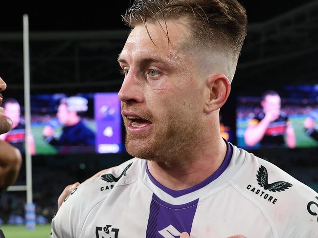 SYDNEY, AUSTRALIA - SEPTEMBER 22:  Cameron Munster of the Storm and Nathan Cleary of the Panthers embrace following the NRL Preliminary Final match between the Penrith Panthers and Melbourne Storm at Accor Stadium on September 22, 2023 in Sydney, Australia. (Photo by Matt King/Getty Images)