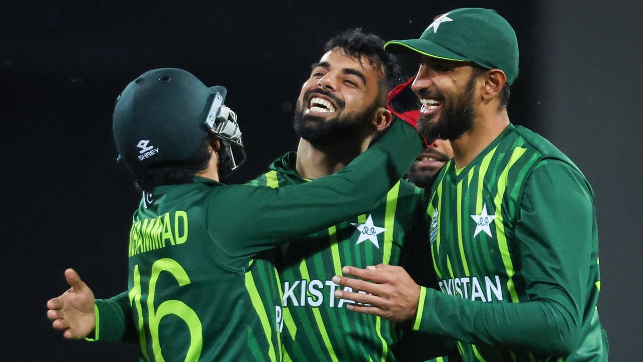 Shadab Khan reacts with teammates. Photo by DAVID GRAY / AFP