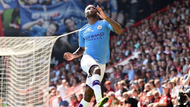 Manchester City's English midfielder Raheem Sterling celebrates scoring his team's second goal during the English Premier League football match between Bournemouth and Manchester City at the Vitality Stadium in Bournemouth, southern England on August 25, 2019. (Photo by Glyn KIRK / AFP) / RESTRICTED TO EDITORIAL USE. No use with unauthorized audio, video, data, fixture lists, club/league logos or 'live' services. Online in-match use limited to 120 images. An additional 40 images may be used in extra time. No video emulation. Social media in-match use limited to 120 images. An additional 40 images may be used in extra time. No use in betting publications, games or single club/league/player publications. /