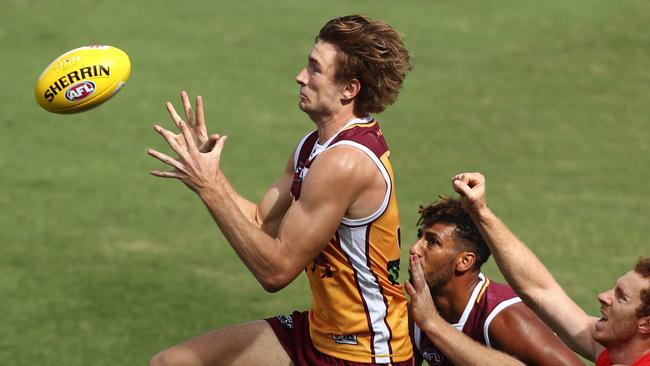 Harris Andrews takes a make for the Lions. Picture: Getty Images