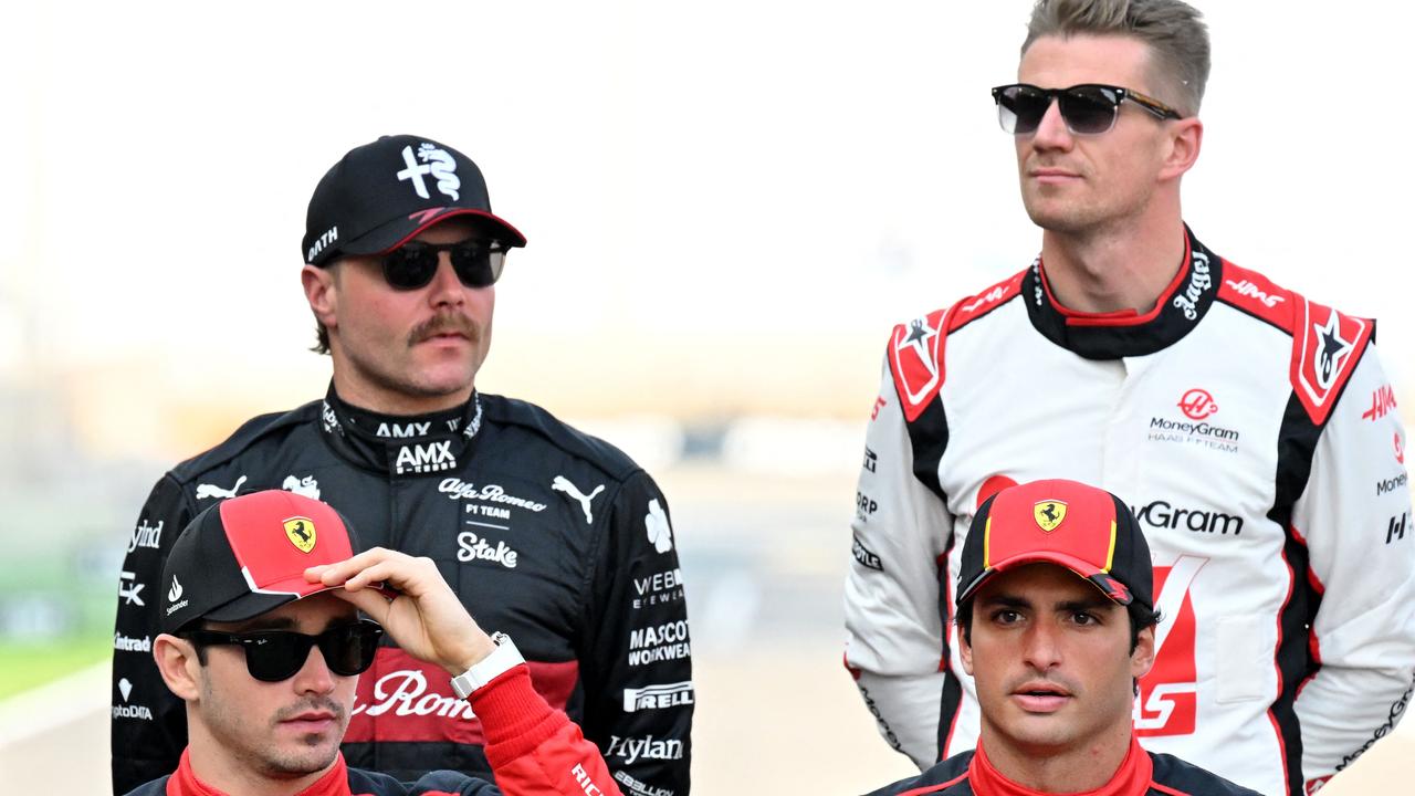 Formula 1 drivers gather for an official photo shoot in Bahrain. Photo by ANDREJ ISAKOVIC / AFP.