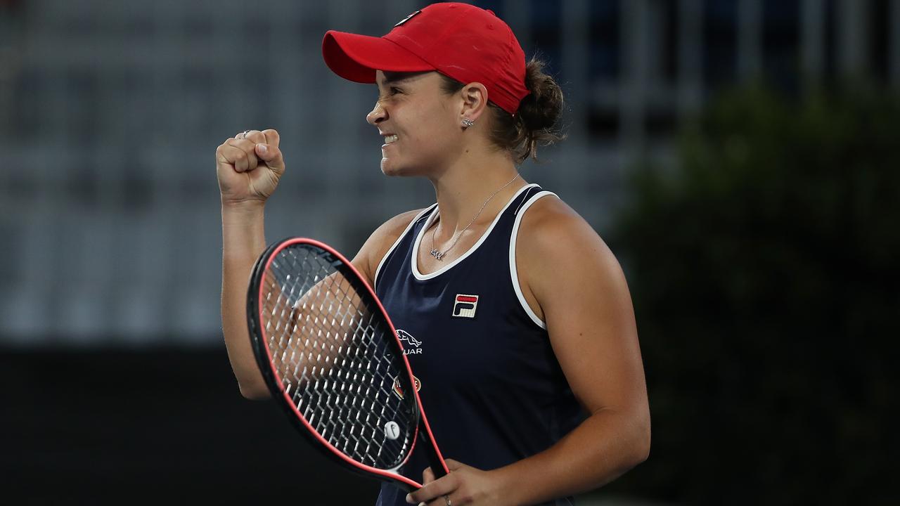 Ash Barty is jubilant after winning match point against Daniell Collins.