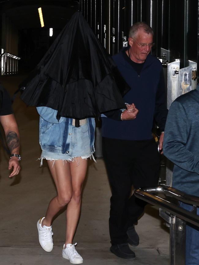 Taylor Swift and her father, Scott, at the Neutral Bay wharf early Tuesday morning. Picture: Matrix