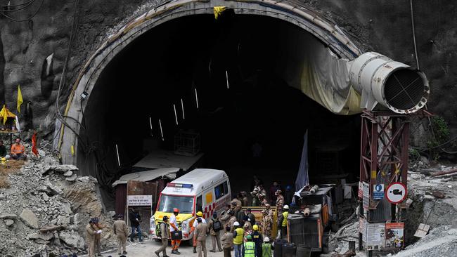 Ambulance and rescue operatives gather near the face of the collapsed Silkyara tunnel in Uttarakhand state in northern India. Picture: Sajjad Hussain/AFP