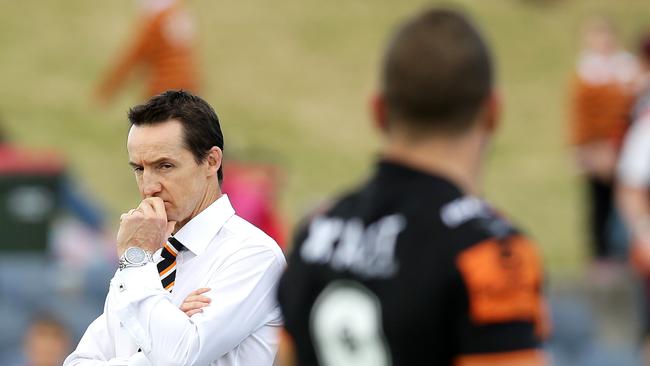 Tigers coach Jason Taylor looks at Robbie Farah during warm up for the NRL game between the Wests Tigers and the New Zealand Warriors at Campbelltown Stadium , Campbelltown.Picture Gregg Porteous