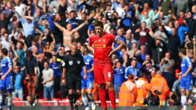 A dejected Steven Gerrard of Liverpool looks on after last season’s loss to Chelsea.