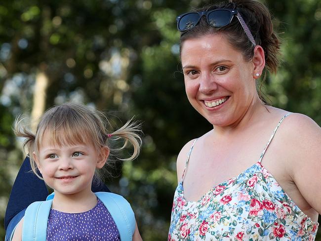 Sarah Whelan, 38, with her daughter Lily, 2, on their way to WA, haven't seen her husband since the first week of March due to COVID restrictions. Photographer: Liam Kidston.