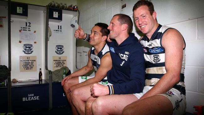 Matthew Stokes, James Kelly and Steve Johnson in the rooms after their last game for Geelong. Picture: Colleen Petch