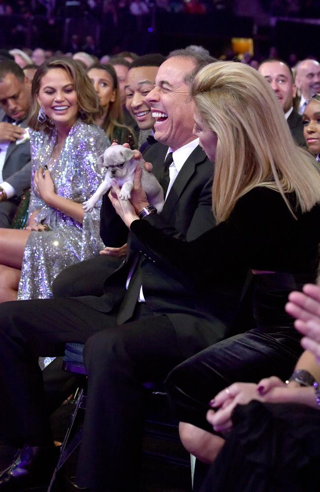 Chrissy Teigen, John Legend, Jerry Seinfeld and Jessica Seinfeld attend the 60th Annual GRAMMY Awards at Madison Square Garden on January 28, 2018 in New York City. Picture: Getty