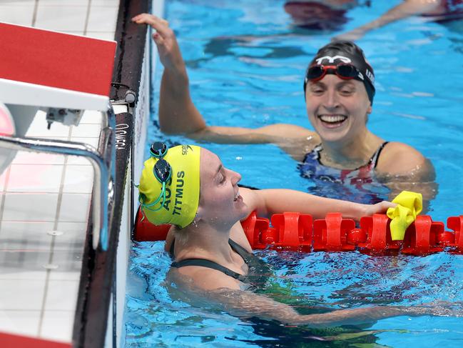 TOKYO, JAPAN - JULY 26: Ariarne Titmus of Team Australia and Katie Ledecky of Team United States react after competing in the Women's 400m Freestyle Final on day three of the Tokyo 2020 Olympic Games at Tokyo Aquatics Centre on July 26, 2021 in Tokyo, Japan. (Photo by Al Bello/Getty Images)