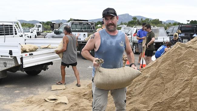 Townsville residents fill sandbags in preparation for the oncoming cyclone. Picture: Getty Images