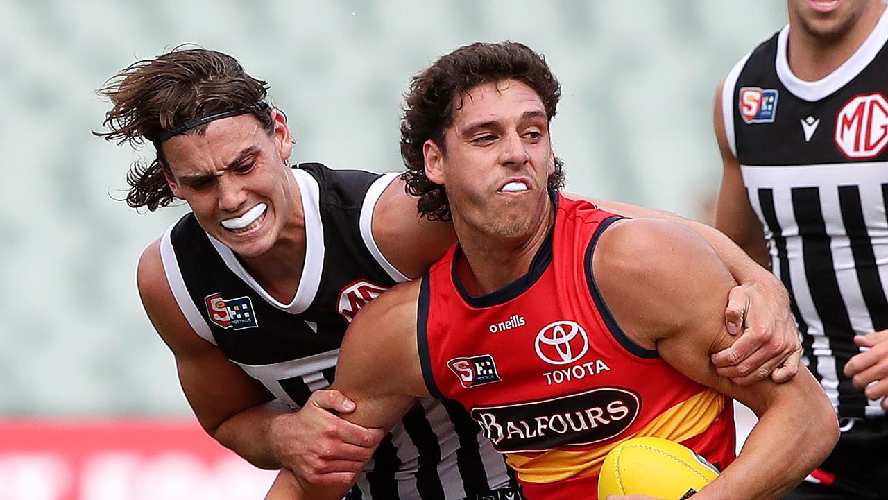 Saturday, 1st April, 2023 - SANFL Showdown. Port Adelaide v Adelaide Crows at the Adelaide Oval. James Borlase of the Adelaide Crows. And Ollie Lord of Port Adelaide Picture: Sarah Reed