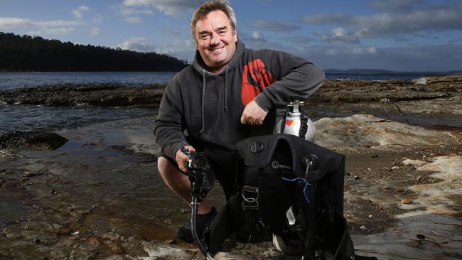 Diver Dane Jones of Lenah Valley is happy to be heading back out to snag a few scallops. Picture: Zak Simmonds