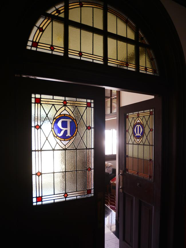 Some of the beautiful stained glass doors and windows in the former Mount Carmel Convent. Photo by Stuart Quinn.