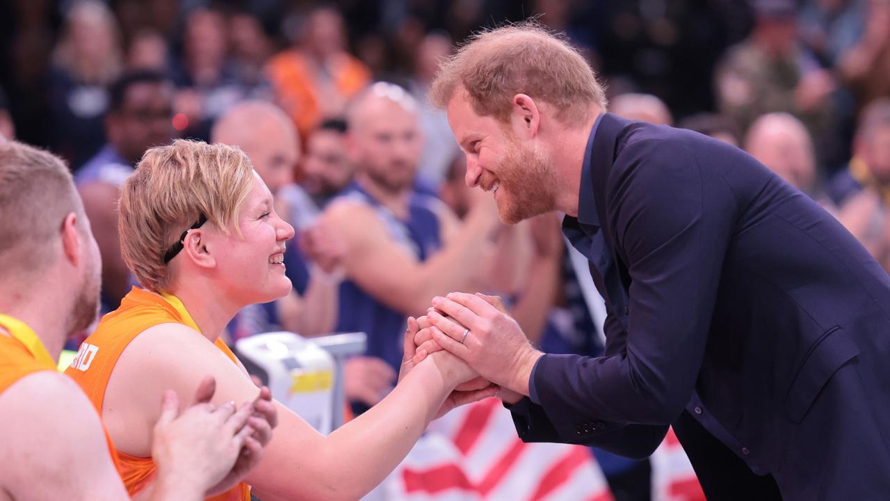 Prince Harry celebrates with Team Netherlands after they won the Silver Medal at the Wheelchair Basketball Finals during day seven of the Invictus Games. Picture: Chris Jackson/Getty Images for the Invictus Games Foundation