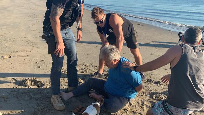 Disgraced businessman and conman Peter Foster was arrested by detectives on a Port Douglas beach this morning.