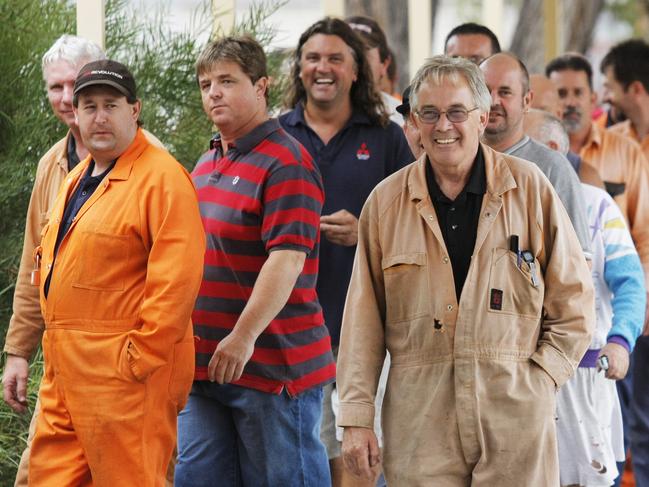 Employees of Mitsubishi Motors shortly before receiving today's decision outside the factory in Adelaide, Tuesday, Jan. 5, 2008. Mitsubishi Motors today announced the closure of the Tonsley Park production facility in Adelaide. (AAP Image/Rob Hutchison) NO ARCHIVING