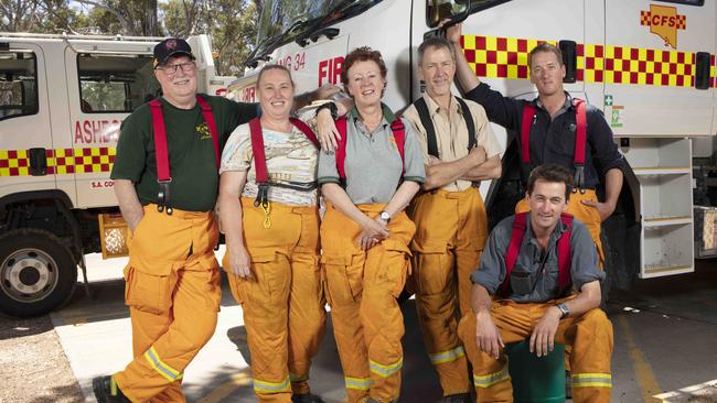 CFS volunteers from Ashbourne and Milang brigades Alistair McInnes, Katherine Murray, Rob Crase, Jac Gates, Douglas McInnes, Chris Harvey are hero firefighters as they saved a man from a burning mansion near Woodside during the Cudlee Creek Bushfires. Picture: AAP/Emma Brasier