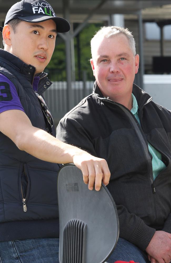 Sacred Star owner Kyan Yap and trainer Tony Pike at last year’s Stradbroke barrier draw. Picture: Jono Searle