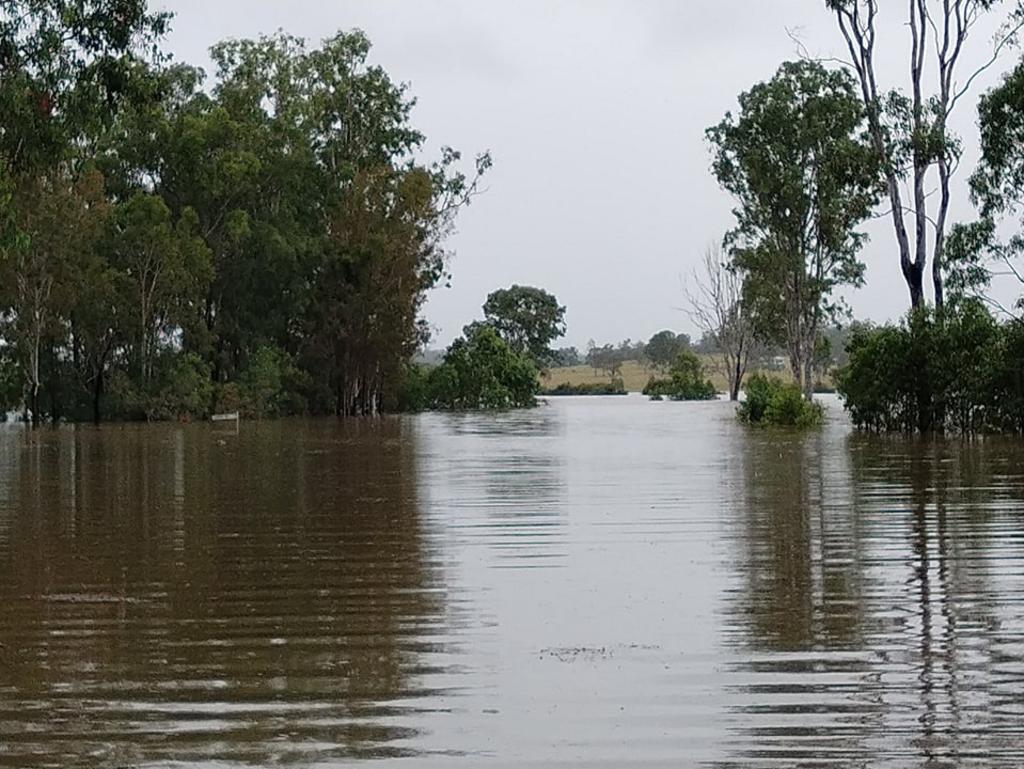 Water over the road of Beresford Rd, Boompa after torrential rain in the North Burnett, February 25, 2022. Photo: Hayden Beresford