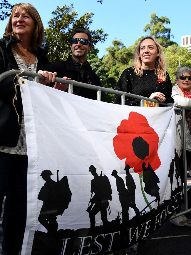 Spectators are seen during the Anzac Day march in Sydney. Picture: NCA NewsWire/Bianca De Marchi