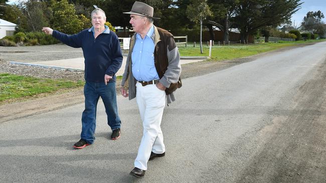 Johnny Mason and Herb Mueller walk down the main straight of Clarkefield, where they’d like to see development. Picture: Carmelo Bazzano