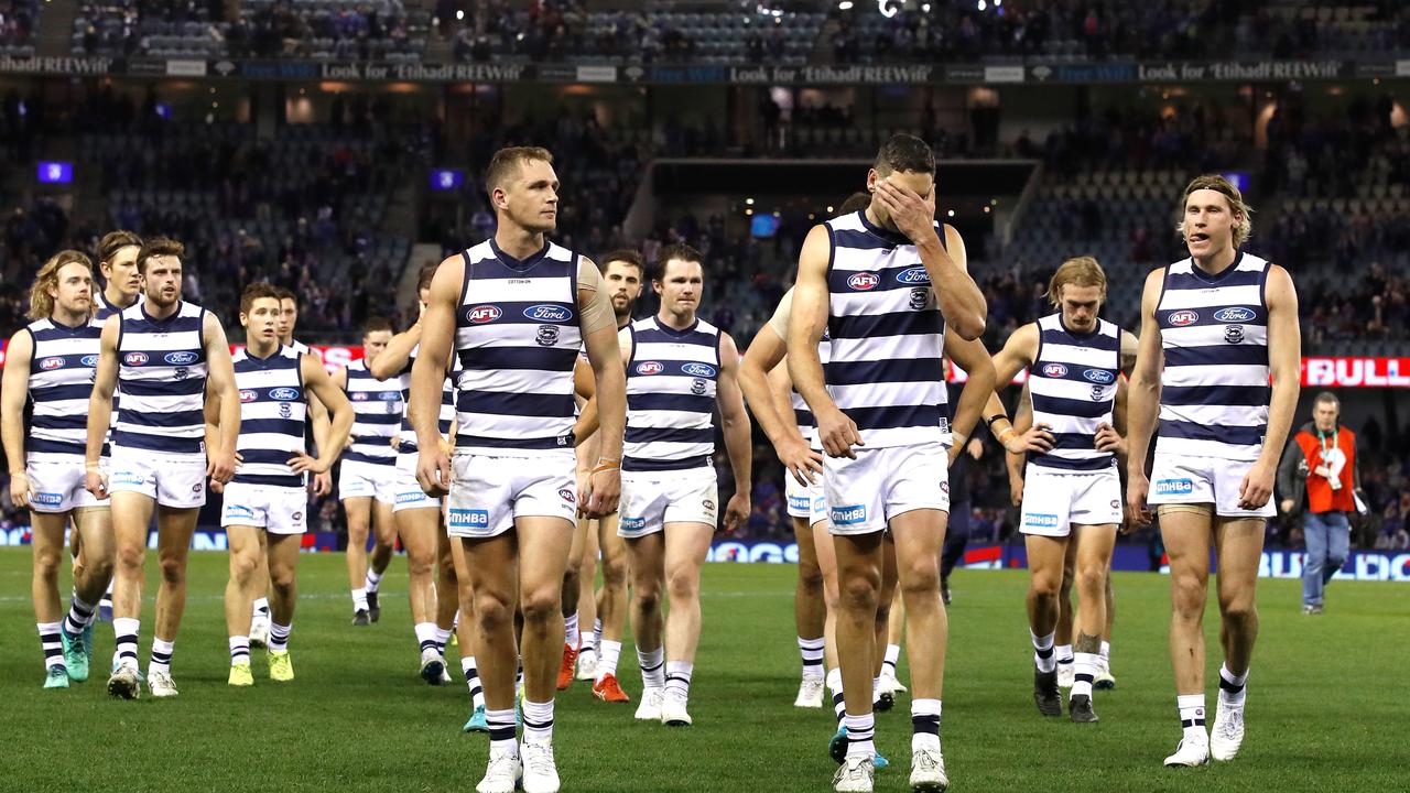 Geelong players leave the ground after losing to the Western Bulldogs.