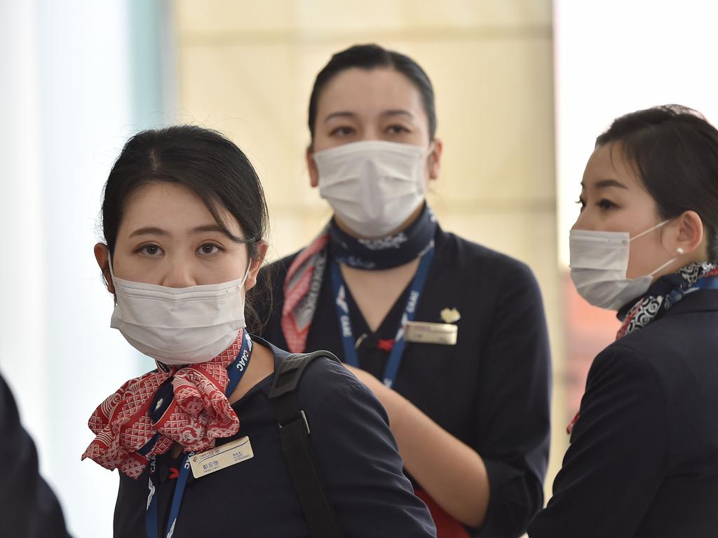 China Eastern Airlines aircrew arrive at Sydney Airport in January 2020. Picture: Peter Parks/AFP