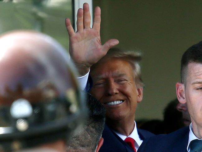 Donald Trump waves to supporters after he appeared for his arraignment in Miami. Picture: Getty/AFP