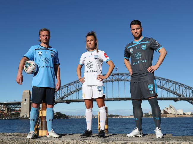 WARNING EMBARGOED UNTIL 7PM WED 24TH JULY - Sydney FC football players Rhyan Grant, Angelique Hristodoulou and Alex Baumjohann wearing their new playing kits at Blues Point Reserve, Sydney. Picture: Brett Costello