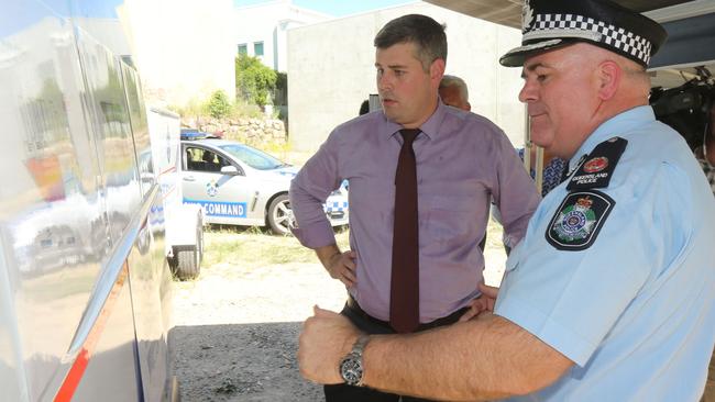 Police Minister Mark Ryan and Assistant Commissioner Brian Codd view concept plans for a new multipurpose police facility at Arundel, expected to be complete by 2019. Picture: Mike Batterham.