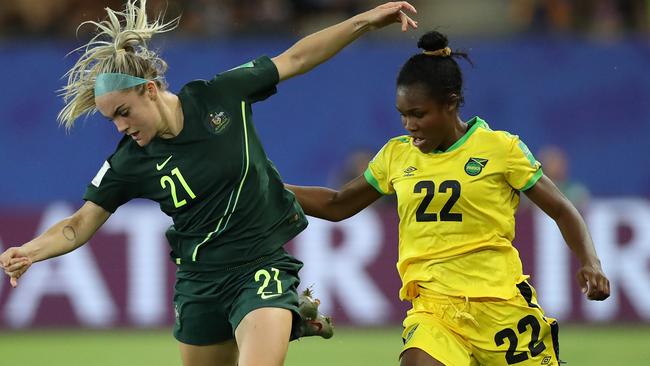 Ellie Carpenter had her hands full against the Jamaican attack.