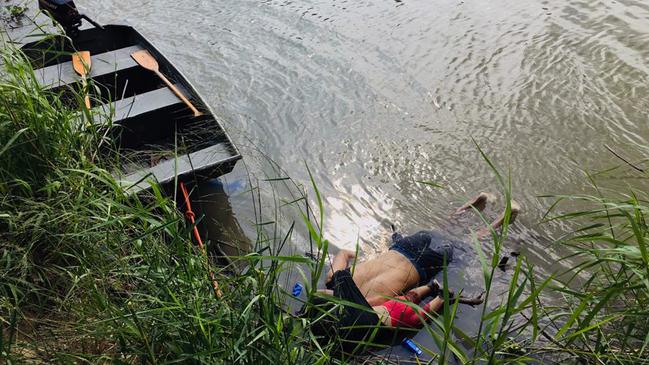 Former Housing and Urban Development Secretary Julián Castro teared up talking about this picture showing the bodies of Salvadoran migrant Oscar Martinez Ramirez and his daughter, who drowned while trying to cross the Rio Grande — on their way to the US — during the debate. Picture: AFP