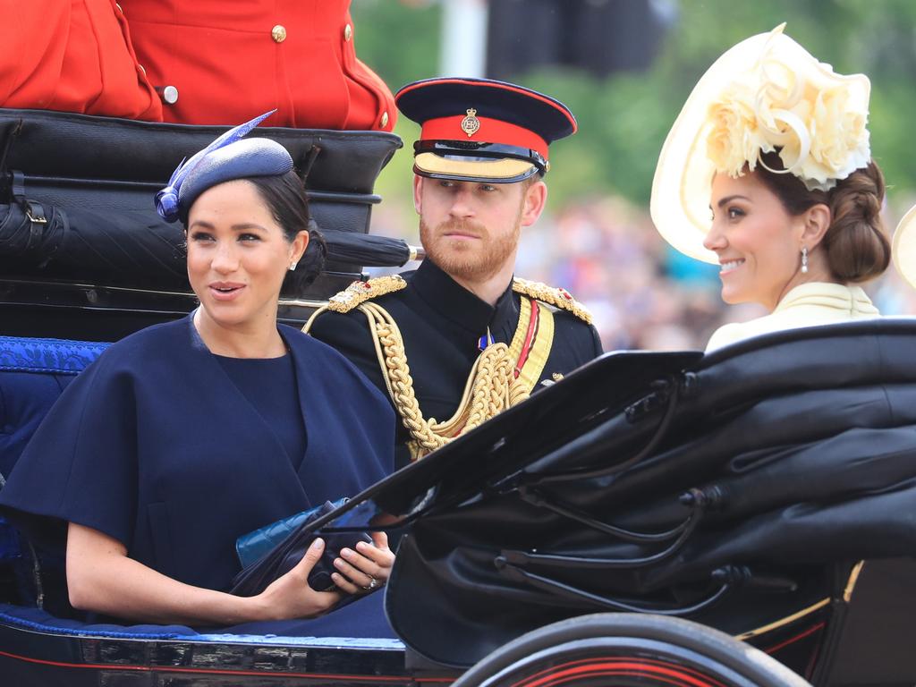 Meghan and Harry with Kate at the Trooping of the Colour earlier this month. Picture: Gareth Fuller/PA Wire