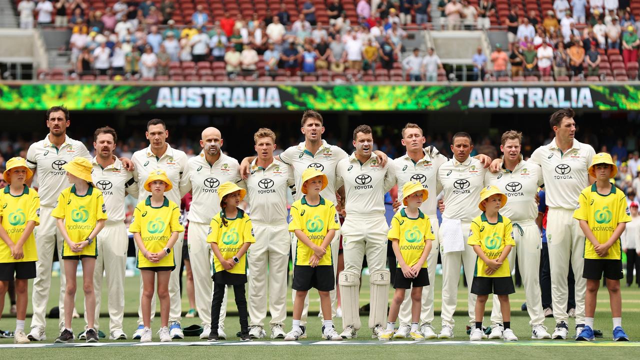 ADELAIDE, AUSTRALIA - DECEMBER 06: Australia players line up for national anthems prior to day one of the Men's Test Match series between Australia and India at Adelaide Oval on December 06, 2024 in Adelaide, Australia. (Photo by Paul Kane/Getty Images)