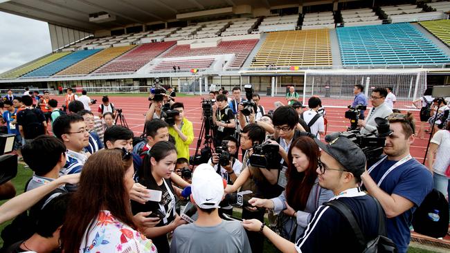 12-year-old Brisbane ball boy Stephen White, who has become something of a lucky charm for China Soccer Team. Stephen being interviewed by Chinese Media at QSAC. Pic Mark Calleja