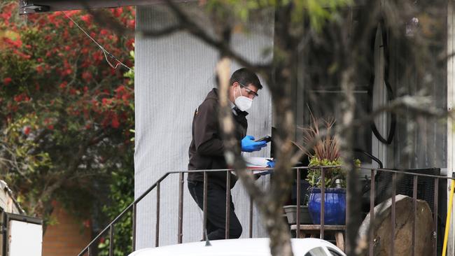 Police at the scene of a search warrant at Raymond Terrace on Wednesday. Picture: Peter Lorimer.