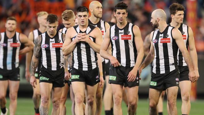 Collingwood players leave the MCG after the loss. Picture: Michael Klein