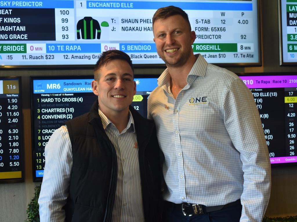 Joshua Lang and Brandon Diplock from One Syndications at the Rockhampton Jockey Club's Pink Ribbon Stradbroke Charity Race Day at Callaghan Park on June 15, 2024.