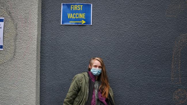 Lynore Smith waits for her friends to receive the Pfizer vaccination at the Inner City Covid-19 Vaccine Hub on July 1 in Sydney. Picture: Lisa Maree Williams/Getty Images