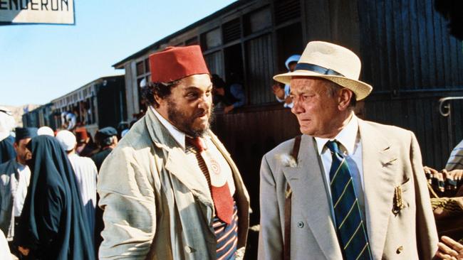 John Rhys-Davies and Denholm Elliott in Raiders Of The Lost Ark.