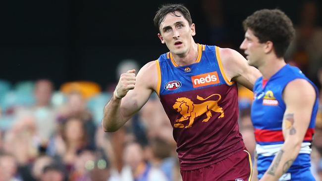 Different cut, same celebration. Oscar McInerney’s grit has earned him plenty of fans at the Brisbane Lions. Picture: Chris Hyde/Getty Images