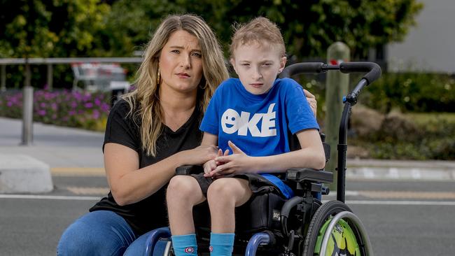 Samuel  Amiet, 11, was left waiting for a taxi for three hours at Coomera Westfield,  after his job was repeatedly rejected. Simone Amiet with her son Samuel Amiet, 11. Picture:  Jerad Williams