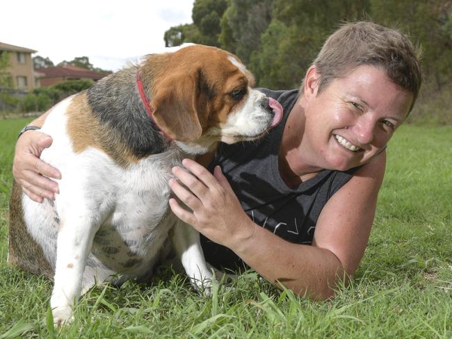 Engaging your pet in physical activity is important, as Kristen Mallinson and her dog Scout have discovered. Picture: AAP/Simon Bullard