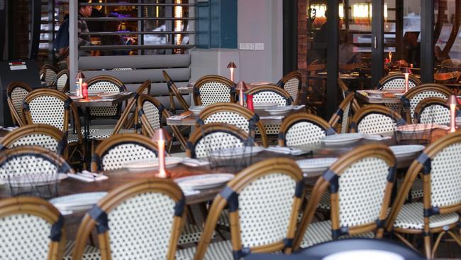 Empty chairs at Criniti's Restaurant in Woolloomooloo. Picture: Christian Gilles