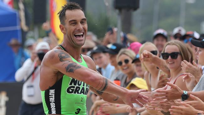 Matt Poole celebrates winning the second round of the Nutri-Grain series at Burleigh Heads.