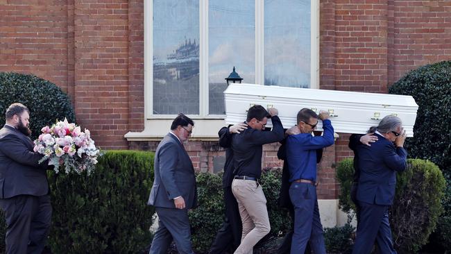 Brooke Sorlie’s father Svein Sorlie (front right) helps carry his daughter’s casket. Picture: Sam Ruttyn