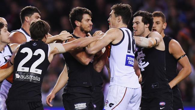 Alex Silvagni wrestles with Jeremy Cameron before his injury. Picture: Getty Images