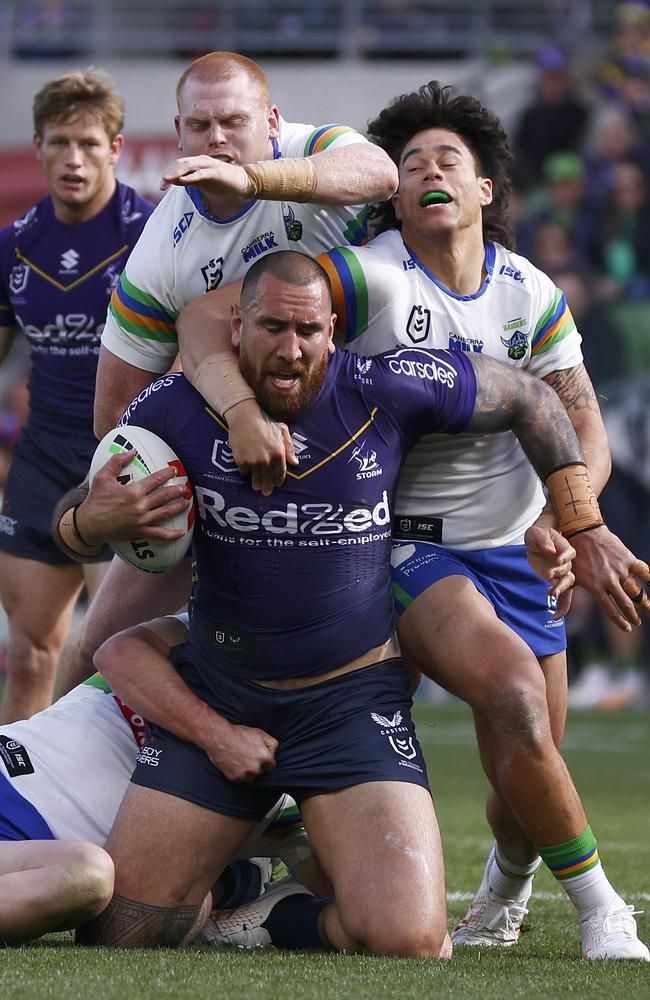 Nelson Asofa-Solomona of the Storm is tackled during round 24. (Photo by Daniel Pockett/Getty Images)